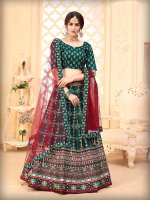 Fancy Designer Lehenga Choli In Green Color Fabricated On Art Silk Beautified With Attractive Digital Printed And Dupatta In Maroon Color On Net Fabricated. 