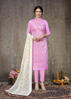 Grab This Designer Straight Suit For Your Semi-Casual Wear In Fine Color Paired With Contrasted Colored Bottom and Dupatta. Its Top Are Glass Cotton With Embroidery and Dupatta Are Chanderi Gotta Work Based Paired With Cotton Bottom. 