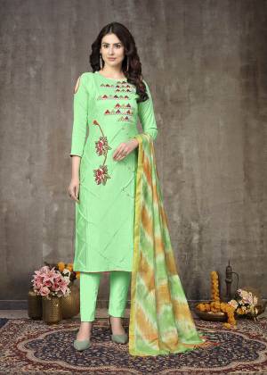 Grab This Designer Straight Suit For Your Semi-Casual Wear In Fine Color Paired With Contrasted Colored Bottom and Dupatta. Its Top Are Glass Cotton With Embroidery and Dupatta Are Naznin Based Paired With Cotton Bottom. 