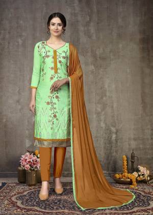 Grab This Designer Straight Suit For Your Semi-Casual Wear In Fine Color Paired With Contrasted Colored Bottom and Dupatta. Its Top Are Glass Cotton With Embroidery and Dupatta Are Naznin Based Paired With Cotton Bottom. 