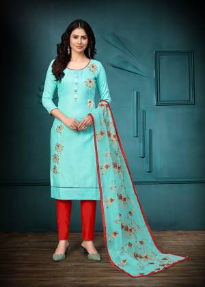 Grab This Designer Straight Suit For Your Semi-Casual Wear In Fine Color Paired With Contrasted Colored Bottom and Dupatta. Its Top Are Glass Cotton With Embroidery and Dupatta Are Organza Work Based Paired With Cotton Bottom. 