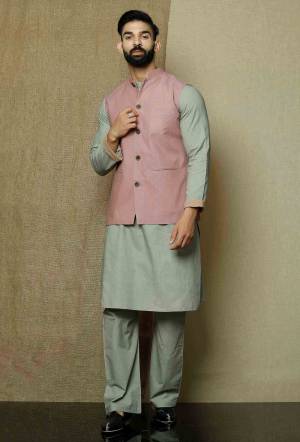 Here Is A Rich And Decent Looking Readymade Pair Of Men's Kurta Pyjama With Jacket. This Kurta And Pyjama Are Fabricated On Cotton Paired With Cotton Fabricated Jacket. Buy This Pair For The Upcoming Wedding And Festive Season. 

