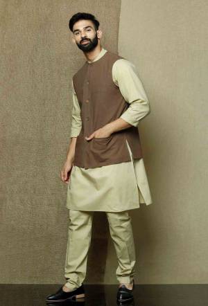 Here Is A Rich And Decent Looking Readymade Pair Of Men's Kurta Pyjama With Jacket. This Kurta And Pyjama Are Fabricated On Cotton Paired With Cotton Fabricated Jacket. Buy This Pair For The Upcoming Wedding And Festive Season. 

