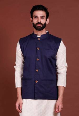 Here Is A Rich And Decent Looking Readymade Pair Of Men's Kurta Pyjama With Jacket. This Kurta And Pyjama Are Fabricated On Cotton Paired With Cotton Fabricated Jacket. Buy This Pair For The Upcoming Wedding And Festive Season. 

