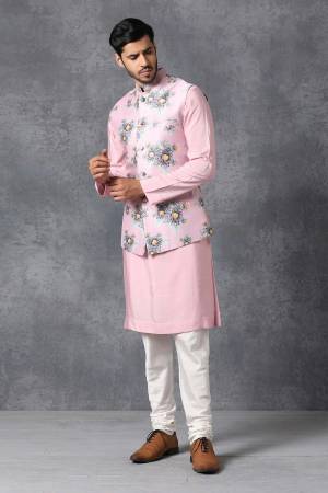 Here Is A Rich And Decent Looking Readymade Pair Of Men's Kurta Pyjama With Jacket. This Kurta And Pyjama Are Fabricated On Raw Silk Paired With Satin Printed Fabricated Jacket. Buy This Pair For The Upcoming Wedding And Festive Season. 

