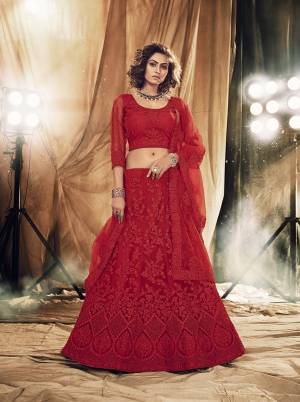 This Wedding Season Heavy Designer Lehenga Choli In Red Color Fabricated On Net Beautified With Heavy Attractive Cording Embroidery With Dupatta. 