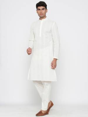 Take your ethnic style quotient to the next level by wearing this fashionable kurta set By Cotton Fabeic In Wevon Design. which has been designed keeping the latest trends in mind. This set is a must have in a men's ethnic wardrobe.