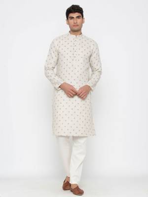 Your ethnic style quotient to the next level by wearing this fashionable kurta Are Satin Cotton Fancy Printed And Bottom Are Cotton Fabeic. which has been designed keeping the latest trends in mind. This set is a must have in a men's ethnic wardrobe.