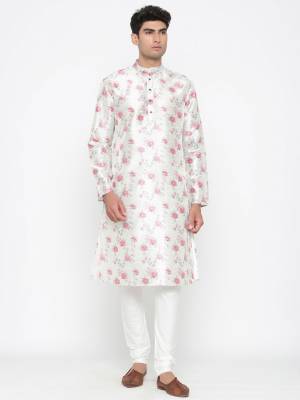 Your ethnic style quotient to the next level by wearing this fashionable kurta Are Satin Cotton Fancy Printed And Bottom Are Cotton Fabeic. which has been designed keeping the latest trends in mind. This set is a must have in a men's ethnic wardrobe.