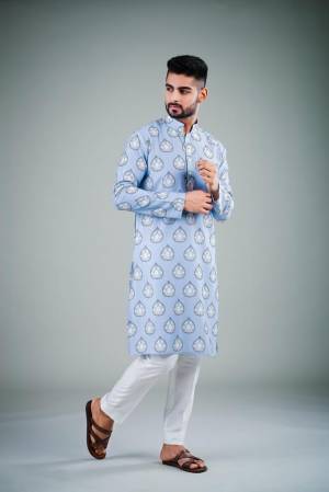 Your ethnic style quotient to the next level by wearing this fashionable kurta Are Satin Cotton Fancy Printed And Bottom Are Cotton Fabeic. which has been designed keeping the latest trends in mind. This set is a must have in a men's ethnic wardrobe.