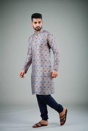 Your ethnic style quotient to the next level by wearing this fashionable kurta Are Satin Cotton Fancy Printed And Bottom Are Cotton Fabeic. which has been designed keeping the latest trends in mind. This set is a must have in a men's ethnic wardrobe.