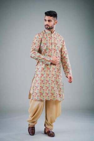 Your ethnic style quotient to the next level by wearing this fashionable kurta Are Satin Cotton Fancy Printed And Bottom Are Cotton Fabeic. which has been designed keeping the latest trends in mind. This set is a must have in a men's ethnic wardrobe.