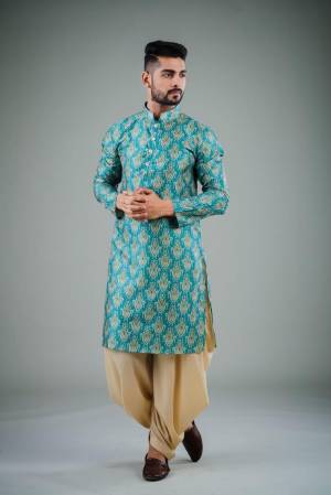 Your ethnic style quotient to the next level by wearing this fashionable kurta Are Satin Cotton Fancy Printed And Bottom Are Cotton Fabeic. which has been designed keeping the latest trends in mind. This set is a must have in a men's ethnic wardrobe.