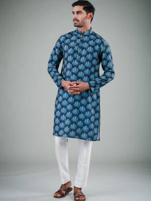 Your ethnic style quotient to the next level by wearing this fashionable kurta Are Satin Cotton Fancy Printed And Bottom Are Cotton Fabeic. which has been designed keeping the latest trends in mind. This set is a must have in a men's ethnic wardrobe.