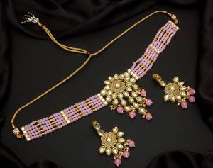 Give An Enhanced Look To Your Personality By Pairing Up This Beautiful Necklace Set With Your Ethnic Attire. This Pretty Set Is In Color Beautified With Pearl And Stone Work. Buy Now.