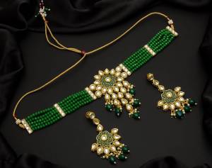 Give An Enhanced Look To Your Personality By Pairing Up This Beautiful Necklace Set With Your Ethnic Attire. This Pretty Set Is In Color Beautified With Pearl And Stone Work. Buy Now.