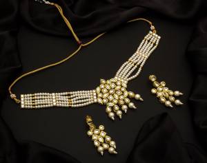 Give An Enhanced Look To Your Personality By Pairing Up This Beautiful Necklace Set With Your Ethnic Attire. This Pretty Set Is In Color Beautified With Pearl And Stone Work. Buy Now.