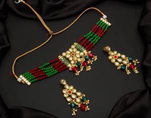 Give An Enhanced Look To Your Personality By Pairing Up This Beautiful Necklace Set With Your Ethnic Attire. This Pretty Set Is In Color Beautified With Pearl And Stone Work. Buy Now.