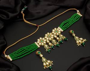 Give An Enhanced Look To Your Personality By Pairing Up This Beautiful Necklace Set With Your Ethnic Attire. This Pretty Set Is In Color Beautified With Pearl And Stone Work. Buy Now.