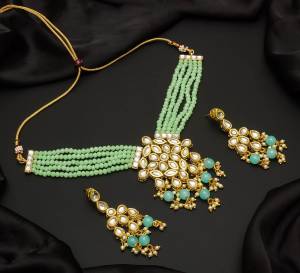 Give An Enhanced Look To Your Personality By Pairing Up This Beautiful Necklace Set With Your Ethnic Attire. This Pretty Set Is In Color Beautified With Pearl And Stone Work. Buy Now.