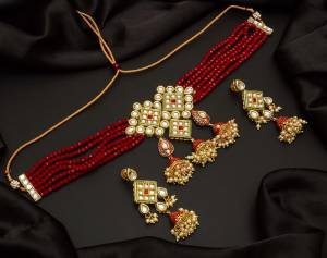 Give An Enhanced Look To Your Personality By Pairing Up This Beautiful Necklace Set With Your Ethnic Attire. This Pretty Set Is In Color Beautified With Pearl And Stone Work. Buy Now.