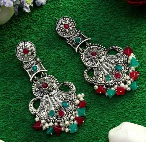 An Enhanced Look To Your Personality By Pairing Up This Beautiful Earring Set With Your Ethnic Attire. This Pretty Set Is In Silver Color Beautified With Kundan Work. Buy Now.