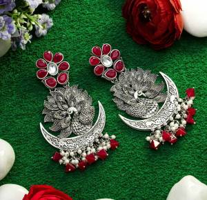 An Enhanced Look To Your Personality By Pairing Up This Beautiful Earring Set With Your Ethnic Attire. This Pretty Set Is In Silver Color Beautified With Kundan Work. Buy Now.