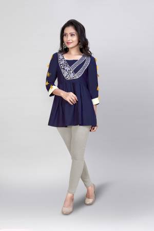 This Readymade Westen Kurti In Fine Color Fabricated On Rayon Beautified With Designer Embroidery Work. It Is Light In Weight And Easy To Carry All Day Long. 