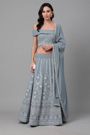 Celebrate This Festive Season With Beauty And Comfort Wearing This Lovely Heavy Designer Embroidry Lehenga Choli In Sky Blue Colored Blouse Paired And Sky Blue Dupatta. This Pretty Blouse And Lehenga Are Georgette Based Paired With Georgette Fabricated Dupatta