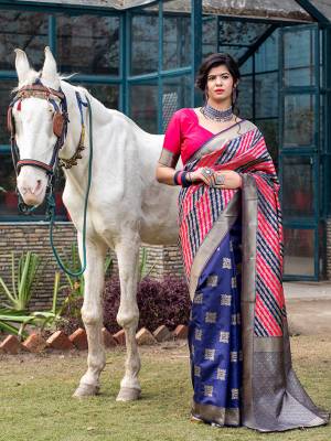 Celebrate This Festive Season In This Very Pretty Weaving Jacquard Nevy Blue Colored Designer Saree Paired With Contrasting Pink Colored Blouse. This Saree and Blouse Are Banarasi Silk Based. 