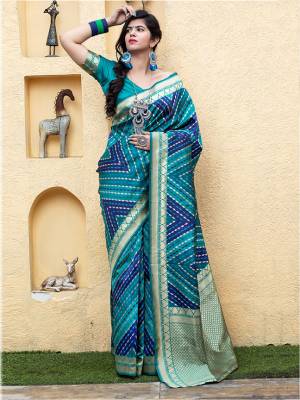 Celebrate This Festive Season In This Very Pretty Weaving Jacquard Blue Colored Designer Saree Paired With Contrasting Blue Colored Blouse. This Saree and Blouse Are Banarasi Silk Based. 