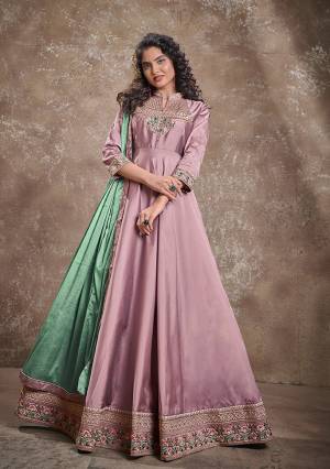 Flaunt Your Rich And Elegant Taste Wearing This Designer Readymade Long Gown In Fine Color With Dupatta. This  Pretty Gown Is Fabricated On Triva Silk Beautified With Heavy Thread Embroidery Work And Chinon Fabriced Dupatta. Its Fabric Is Soft Towards Skin And Easy To Carry All Day Long. 