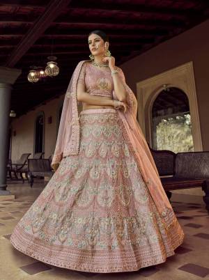 Heavy Designer Lehenga Choli In Peach Color Fabricated On Georgette Beautified With Soft Net Fabricated Dupatta Heavy Attractive Embroidery. 