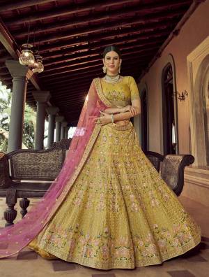 Heavy Designer Lehenga Choli In Musterd Color Fabricated On Organza Beautified With Soft Net Fabricated Dupatta Heavy Attractive Embroidery. 