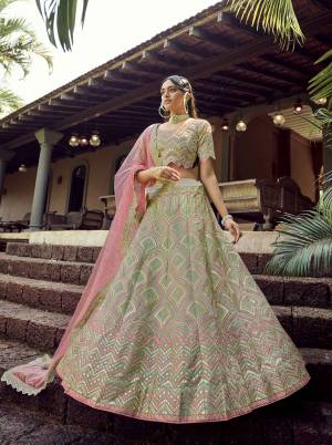 Heavy Designer Lehenga Choli In Olive Color Fabricated On Organza Beautified With Soft Net Fabricated Dupatta Heavy Attractive Embroidery. 