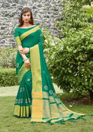 Celebrate This Festive Season In This Very Pretty Wevon Pallu Border Rama Colored Designer Saree Paired With Blouse. This Saree and Blouse Are Silk Based Beautified With Detailed Embroidery. 