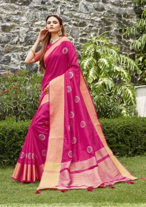 Celebrate This Festive Season In This Very Pretty Wevon Pallu Border Mugenta Colored Designer Saree Paired With Blouse. This Saree and Blouse Are Silk Based Beautified With Detailed Embroidery. 