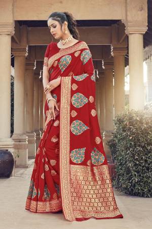 Look Attractive Wearing This Red Colored Saree Paired With Blouse.  This Heavy Designer Pallu Border Wevon And Sirki Work Saree Is Silk Based Which Gives A Rich Look To Your Personality. Buy This Pretty Saree Now.