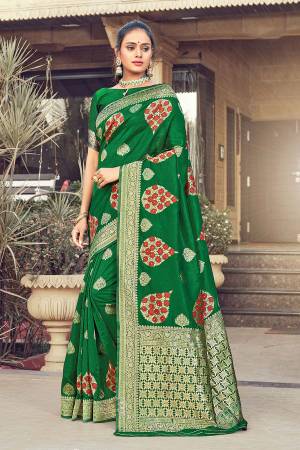 Look Attractive Wearing This Green Colored Saree Paired With Blouse.  This Heavy Designer Pallu Border Wevon And Sirki Work Saree Is Silk Based Which Gives A Rich Look To Your Personality. Buy This Pretty Saree Now.