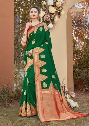 Adorn The Pretty Angelic Look Wearing This Heavy Designer Wevon Border Pallu With Sirki Work Saree In Dark Color Paired With Contrasting  Colored Blouse. This Saree Is Fabricated On Silk Paired With Silk Fabricated Blouse. Its Pretty Color Pallete Will Give An Attractive Look To Your Personality. 