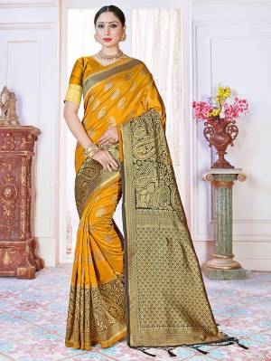 Adorn The Pretty Angelic Look Wearing This Heavy Designer Wevon Jacquard Saree In Dark Color Paired With Blouse. This Saree Is Fabricated On Banarasi Silk Paired With Banarasi Silk Fabricated Blouse. Its Pretty Color Pallete Will Give An Attractive Look To Your Personality. 