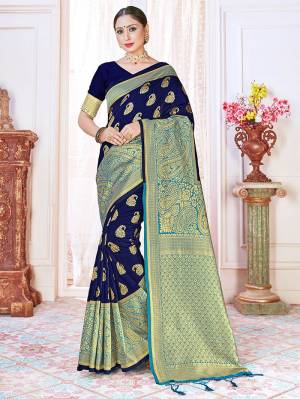 Adorn The Pretty Angelic Look Wearing This Heavy Designer Wevon Jacquard Saree In Dark Color Paired With Blouse. This Saree Is Fabricated On Banarasi Silk Paired With Banarasi Silk Fabricated Blouse. Its Pretty Color Pallete Will Give An Attractive Look To Your Personality. 