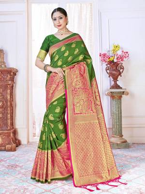 Adorn The Pretty Angelic Look Wearing This Heavy Designer Wevon Jacquard Saree In Dark Color Paired With Blouse. This Saree Is Fabricated On Banarasi Silk Paired With Banarasi Silk Fabricated Blouse. Its Pretty Color Pallete Will Give An Attractive Look To Your Personality. 