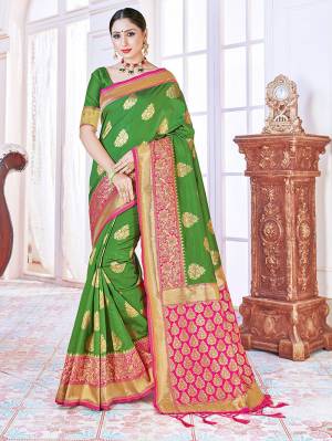 Adorn The Pretty Angelic Look Wearing This Heavy Designer Wevon Jacquard Saree In Dark Color Paired With Blouse. This Saree Is Fabricated On Banarasi Silk Paired With Banarasi Silk Fabricated Blouse. Its Pretty Color Pallete Will Give An Attractive Look To Your Personality. 