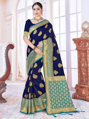 Adorn The Pretty Angelic Look Wearing This Heavy Designer Wevon Jacquard Saree In Dark Color Paired With Blouse. This Saree Is Fabricated On Banarasi Silk Paired With Banarasi Silk Fabricated Blouse. Its Pretty Color Pallete Will Give An Attractive Look To Your Personality. 