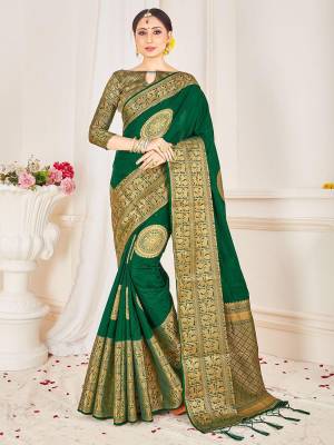 Look Attractive Wearing This Green Colored Saree Paired With Blouse.  This Heavy Wevon Jacquard Designer Saree Is Banarasi Silk Based Which Gives A Rich Look To Your Personality. Buy This Pretty Saree Now.