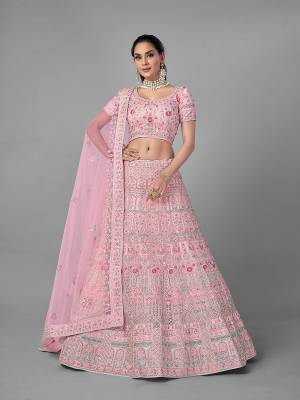 Look Pretty In This Beautiful Heavy Designer Lehenga Choli Is Light Color. This Attractive Embroidered Lehenga Choli Is Fabricated On Soft Net Paired With Soft Net Fabricated Dupatta. It Is Light In Weight And Easy To Carry All Day Long.