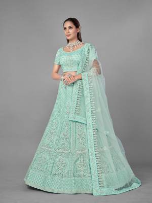 Look Pretty In This Beautiful Heavy Designer Lehenga Choli Is Light Color. This Attractive Embroidered Lehenga Choli Is Fabricated On Soft Net Paired With Soft Net Fabricated Dupatta. It Is Light In Weight And Easy To Carry All Day Long.