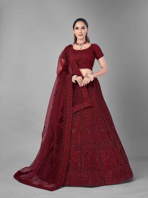 Look Pretty In This Beautiful Heavy Designer Lehenga Choli Is Red Color. This Attractive Embroidered Lehenga Choli Is Fabricated On Soft Net Paired With Soft Net Fabricated Dupatta. It Is Light In Weight And Easy To Carry All Day Long.