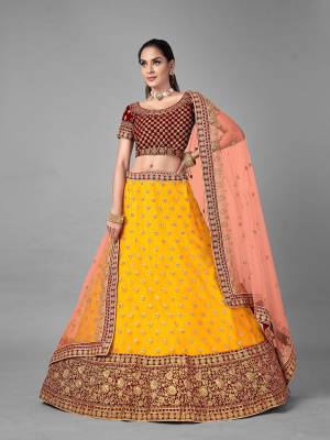 Look Pretty In This Beautiful Heavy Designer Lehenga Choli Is Dark Color. This Attractive Embroidered Lehenga Choli Is Fabricated On Velvet Paired With Soft Net Fabricated Dupatta. It Is Light In Weight And Easy To Carry All Day Long.